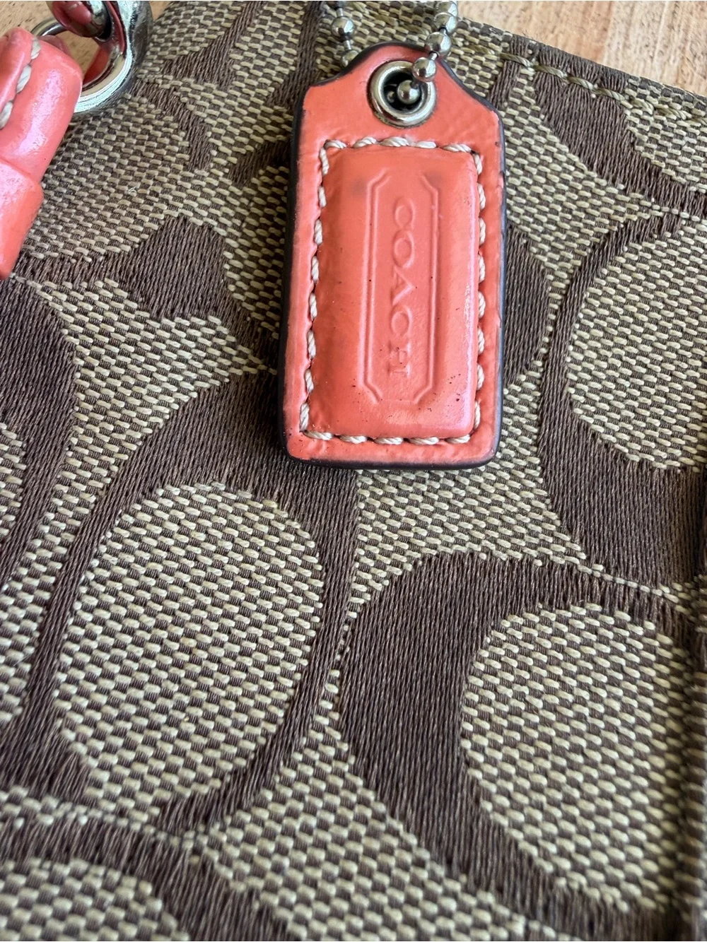 Coach Brown Signature Canvas Wristlet with Coral Trim